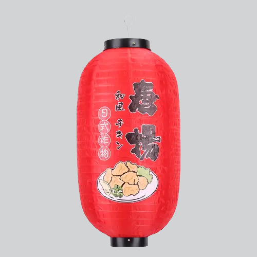 Lanterne japonaise en papier rouge avec des caractères kanji et une illustration de nourriture.