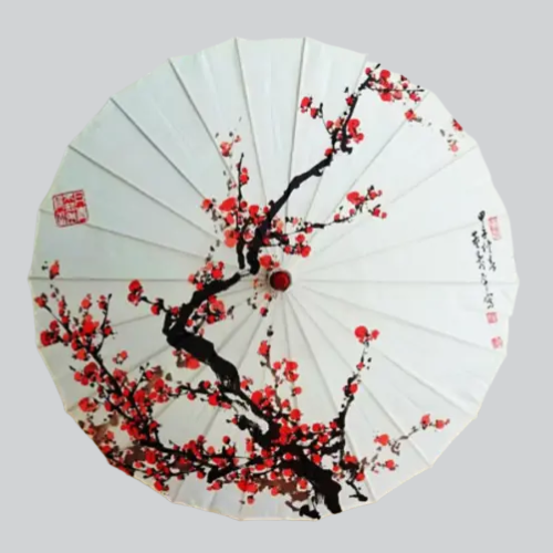 Parapluie traditionnel chinois en papier décoré de fleurs de cerisier.