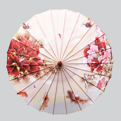 Parasol traditionnel chinois en papier avec des motifs floraux rouges et roses.